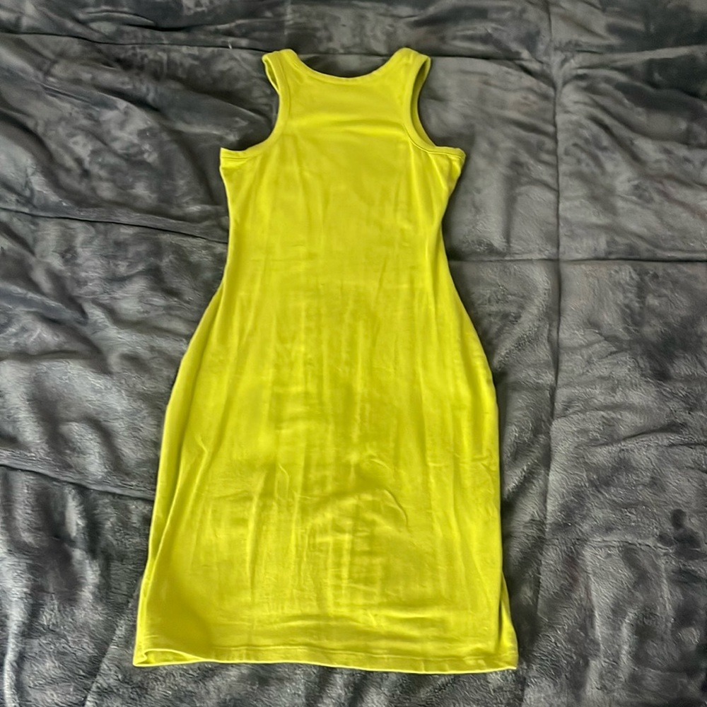 Green form fitting dress